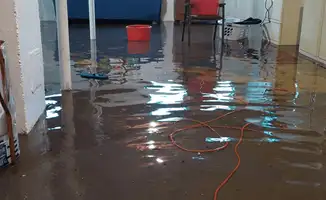 Basement with boiler, cabinets and washing machine completely flooded in Anchorage, AK