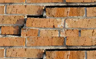 Brick wall with serious structural damage in Anchorage, AK